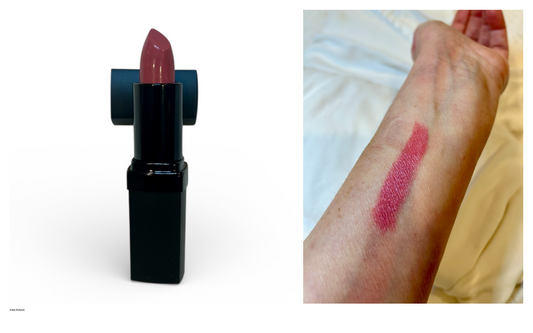 Lipstick with a swatch on skin on a white background